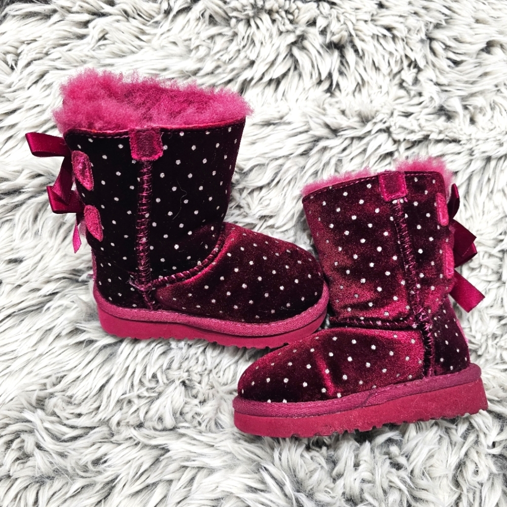 The cutest UGG Starberry boots size 6M for your little one. Color is wine and